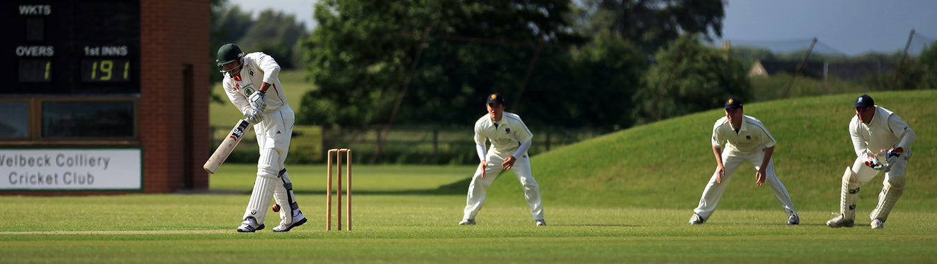 cricket batter and slip fielders